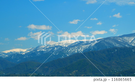 Beautiful View Of The Snow-Covered Spruce And Mountains. Blue Clear Sky. Real time. Beautiful View Of The Snow-Covered Spruce And Mountains. Blue Clear Sky. Real time. 116865665