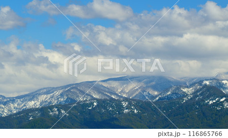 Beautiful View Of The Snow-Covered Spruce And Mountains. Blue Clear Sky. Timelapse. Beautiful View Of The Snow-Covered Spruce And Mountains. Blue Clear Sky. Timelapse. 116865766