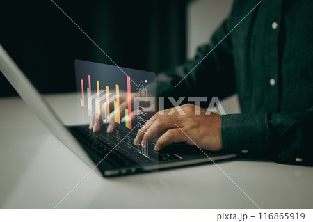 Person typing on a laptop with bar charts and data visualizations floating above. It represents data analysis, business intelligence, and the use of digital tools for performance tracking. Person typing on a laptop with bar charts and data visualizations floating above. It represents data analysis, business intelligence, and the use of digital tools for performance tracking. 116865919