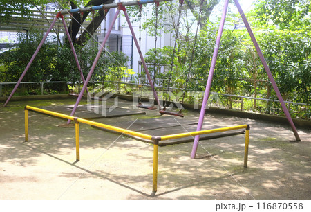 Pink joyful swing for child and kids in Japan playground 116870558
