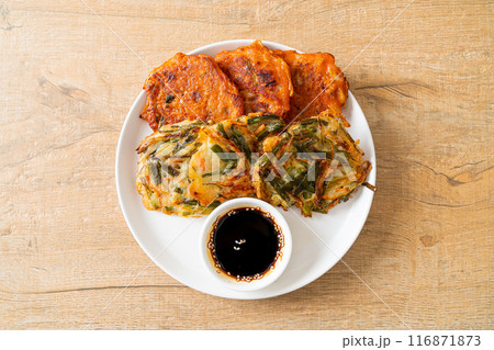 Pajeon or Korean pancake and Korean Kimchi pancake or Kimchijeon on white background Pajeon or Korean pancake and Korean Kimchi pancake or Kimchijeon on white background 116871873