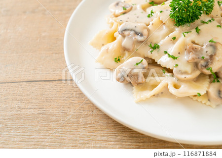 farfalle pasta with mushroom white cream sauce 116871884