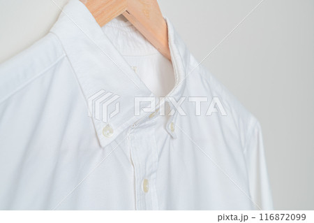 hanging shirt with wood hanger on wall hanging shirt with wood hanger on wall 116872099