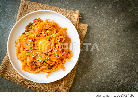 stir-fried udon noodles with kimchi and pork stir-fried udon noodles with kimchi and pork 116872436