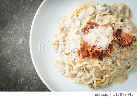 spaghetti with truffle cream sauce and mushroom spaghetti with truffle cream sauce and mushroom 116872443