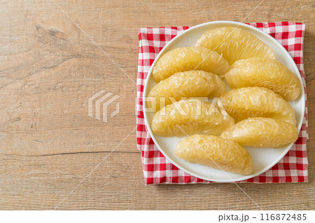 Fresh peeled pomelo, grapefruit or shaddock Fresh peeled pomelo, grapefruit or shaddock 116872485