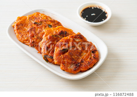 Korean Kimchi pancake or Kimchijeon - Fried Mixed Egg, Kimchi, and Flour 116872488