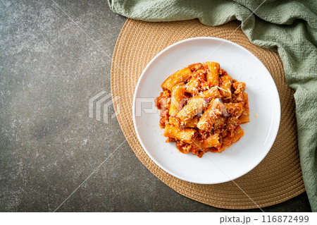 Rigatoni pasta bolognese with cheese Rigatoni pasta bolognese with cheese 116872499