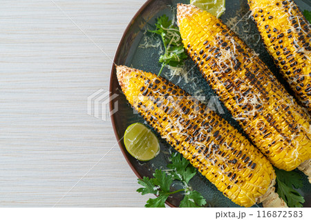 barbecue and grilled corn with cheese and lime barbecue and grilled corn with cheese and lime 116872583