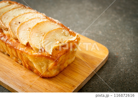 apple loaf crumbled on wood board 116872616