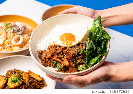 Stir fried Thai basil with wagyu beef and fried egg Stir fried Thai basil with wagyu beef and fried egg 116872625