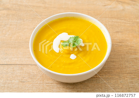 pumpkin soup in white bowl 116872757