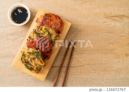 Pajeon or Korean pancake and Korean Kimchi pancake or Kimchijeon on white background 116872767