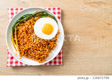 dried Korean spicy instant noodles with fried egg dried Korean spicy instant noodles with fried egg 116872790