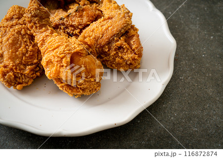 fried chicken with ketchup on plate 116872874