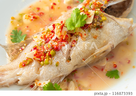 Steamed grouper fish with lime and chillies Steamed grouper fish with lime and chillies 116873393