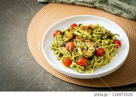 Spaghetti with seafood in homemade pesto sauce Spaghetti with seafood in homemade pesto sauce 116873520