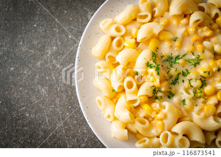 macaroni creamy corn cheese on plate 116873541