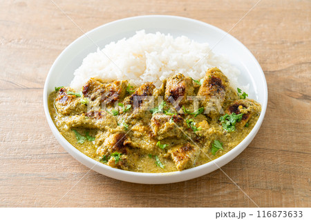 Afghani chicken in green curry or Hariyali tikka chicken hara masala with rice Afghani chicken in green curry or Hariyali tikka chicken hara masala with rice 116873633
