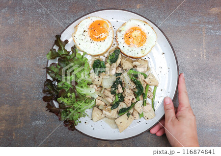 stir-fried chicken with mushroom and kale , sunny side up egg and lettuce stir-fried chicken with mushroom and kale , sunny side up egg and lettuce 116874841