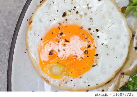 fried egg or sunny side up egg 116875725