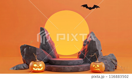 A Halloween-themed scene with a stone pedestal surrounded by rocks, two carved pumpkins 116883502