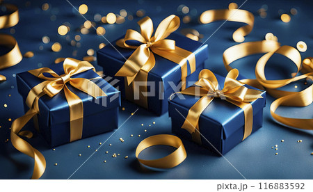 Three blue gift boxes with gold satin ribbons on a blue background. Gifts for Christmas, New Year, Valentine's Day, Birthday 116883592