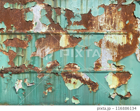 Background texture of scratched rusted steel with peeling paint Background texture of scratched rusted steel with peeling paint 116886134
