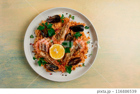 Seafood paella, shrimp and mussels risotto, rice, homemade, top view, no people, Seafood paella, shrimp and mussels risotto, rice, homemade, top view, no people, 116886539
