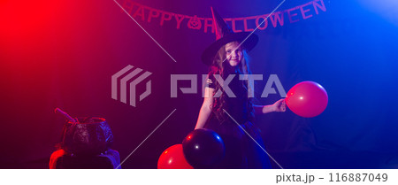 Banner happy laughing child girl in witch costume to Halloween holds jack lantern, copy space Banner happy laughing child girl in witch costume to Halloween holds jack lantern, copy space 116887049