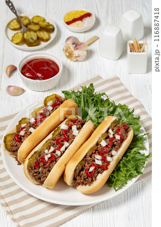 Midwestern Loose Meat Sandwiches on a white plate Midwestern Loose Meat Sandwiches on a white plate 116887418