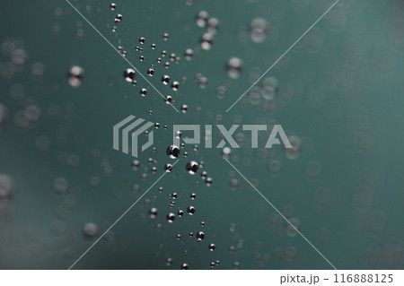 rain drops on glass surface close-up 116888125