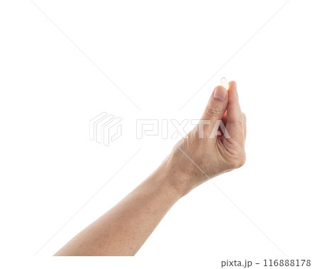 Mid aged female hold transparent pill isolated on white 116888178