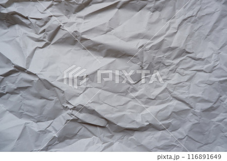 しわくちゃな紙、紙背景素材、シワだらけの紙の表面 しわくちゃな紙、紙背景素材、シワだらけの紙の表面 116891649