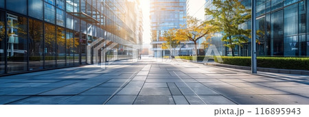 Modern cityscape with glass buildings and reflections, capturing urban calm and business environment. 116895943