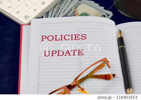 Policies Update Written strategic inscription, explanation, conceptual idea in a composition with motivating elements of banknotes 116901653