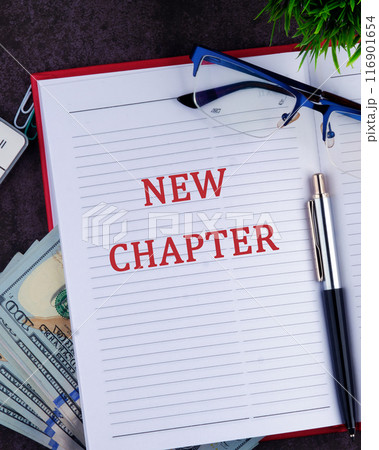 Text sign showing the NEW CHAPTER in a notebook, a vertical photo Text sign showing the NEW CHAPTER in a notebook, a vertical photo 116901654