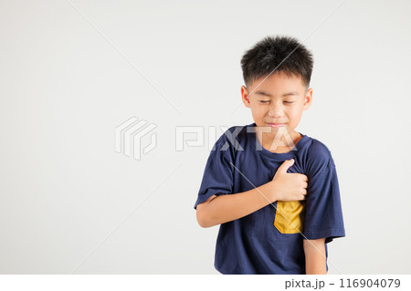 Young kid boy pressing on chest pain isolated on white background, painful expression heartache, primary children having heart attack heart disease, Painful cramps problem Young kid boy pressing on chest pain isolated on white background, painful expression heartache, primary children having heart attack heart disease, Painful cramps problem 116904079