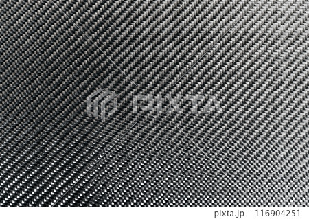 Horizontal photo of textured black carbon fiber panel 116904251