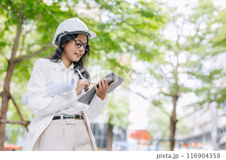 Green Eco Engineer, public park designer. Environmental architect working design for green city saving energy building in modern urban. 116904358