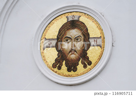 An intricate Byzantine mosaic of Jesus Christ on a circular base, illustrating ancient religious art on the Russian Orthodox Church 116905711