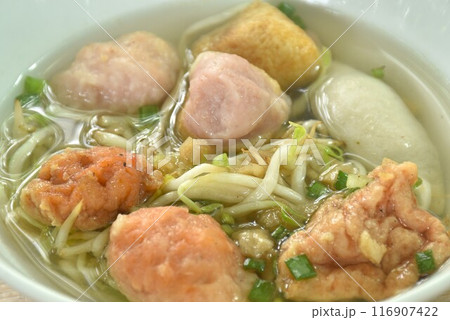 boiled Hakka meatball made from chop pork stuffing fried tofu with bean sprout and lettuce in soup on bowl boiled Hakka meatball made from chop pork stuffing fried tofu with bean sprout and lettuce in soup on bowl 116907422