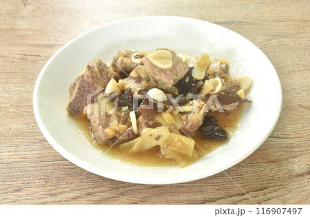 steamed pork rib with chop ginger and black ear mushroom topping garlic in soy sauce on plate  116907497