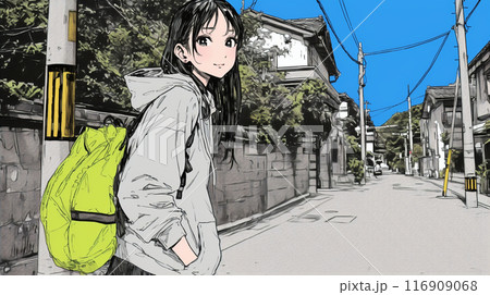 住宅街を歩く若い女性