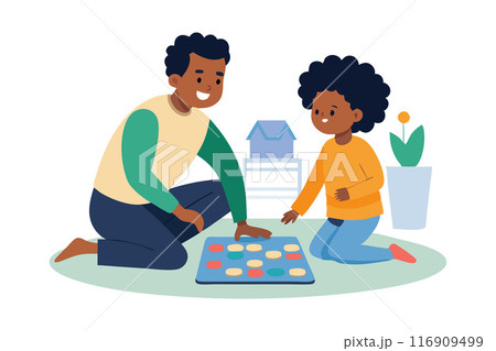 Father and child playing board game together in a cozy home setting, demonstrating quality family time and bonding. 116909499