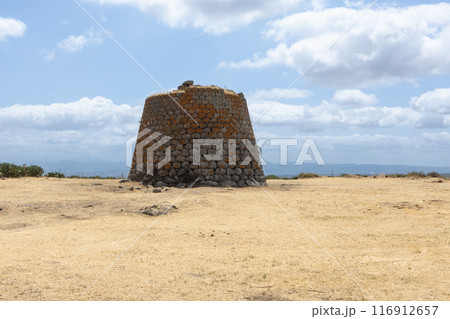 Ancient Nuraghe Tower in Sardinian Landscape. Ancient Nuraghe Tower in Sardinian Landscape. 116912657