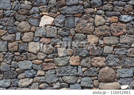 Close-Up of Rough Stone Wall 116912661
