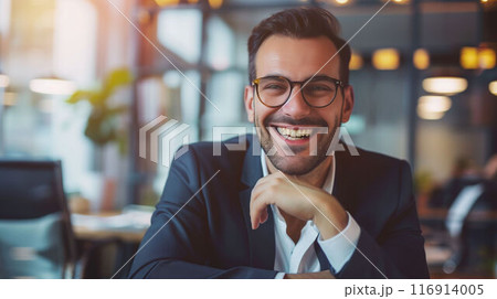 Team of small business professionals collaborating on marketing strategies in modern office 116914005