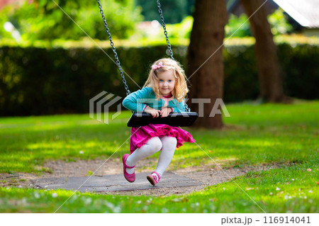 Kids explore nature. Children play in sunny park. Kids explore nature. Children play in sunny park. 116914041