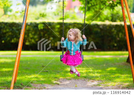 Kids explore nature. Children play in sunny park. Kids explore nature. Children play in sunny park. 116914042
